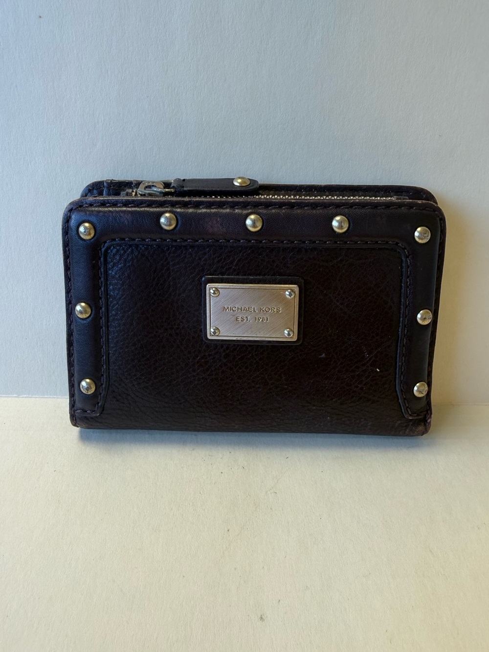 Michael Kors Dark Brown Leather Zip and Snap Wallet with Metal Studs.